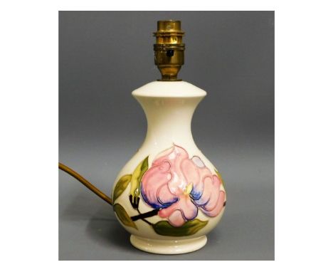 A Moorcroft pottery table lamp, 9in tall 