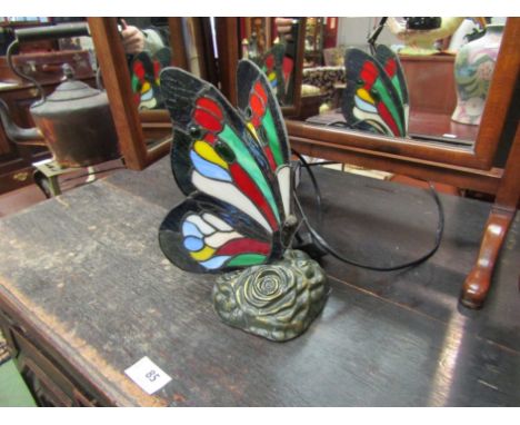 A Tiffany style butterfly form table lamp, 24cm tall
