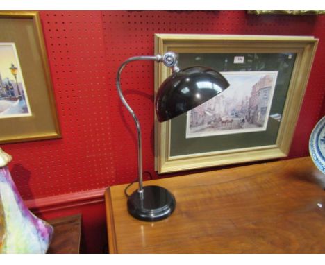 A black metal adjustable table lamp, 47cm tall