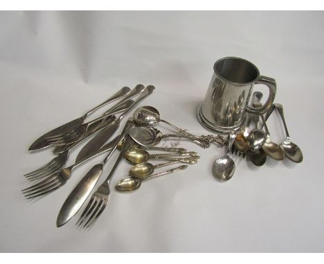 A collection of plated wares including flatware, a baby spoon, teaspoons, Apostle spoons, a Robert Pringle 19th Century drain