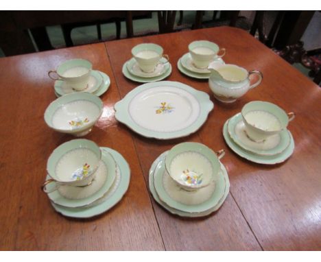 A Paragon green ground part tea service, green/beige ground with floral pattern