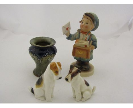 A Goebel Hummel figure "Postman" 119 TMS, Royal Doulton miniature stoneware vase and two Royal Doulton fox terriers (one a/f)