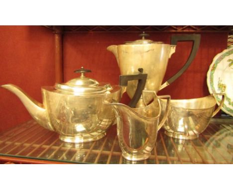 A silver plated four piece coffee and tea service, plain with strap form handles
