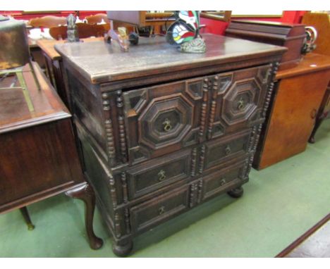 A 17th Century oak chest of three drawers with bobbin and carved panels to fronts, turned squash bun front feet, 93cm x 91cm 