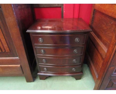 A Georgian style mahogany bow fronted chest of small proportions, the four long drawers over bracket feet, 59cm x 48cm x 35cm