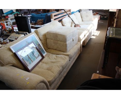 A three seater settee with matching two seater settee with pouffe 