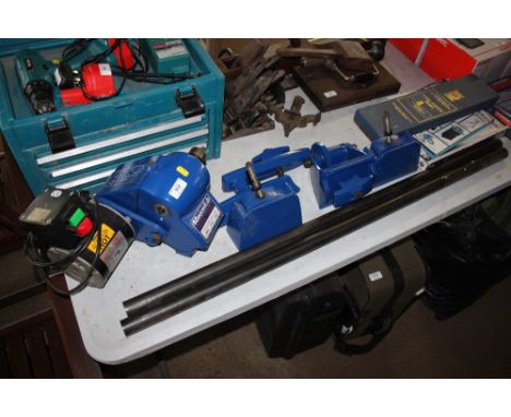 A wood turning lathe together with tools and instructions 