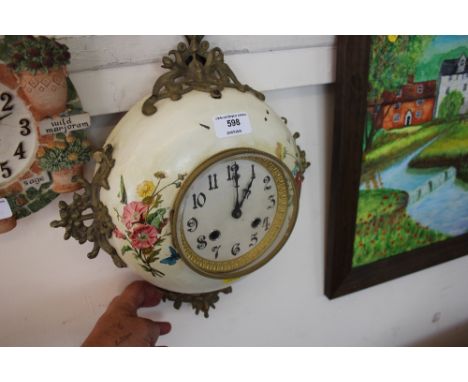 A two hole wall clock