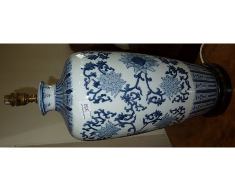 Pair of large ceramic oriental style blue and white table lamp 
