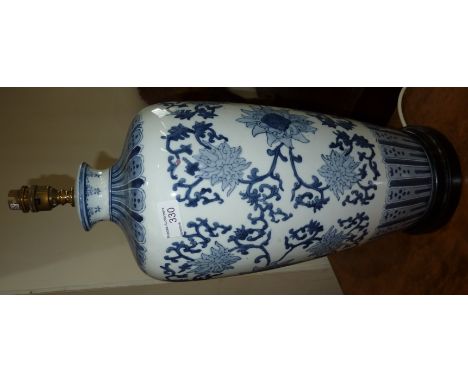 Pair of large ceramic oriental style blue and white table lamp 