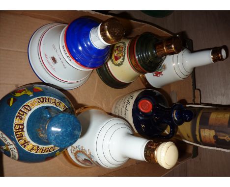 Selection of ceramic decanters including Bells, Black Prince etc.