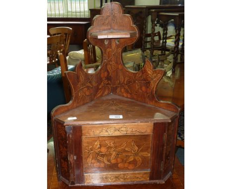 Small corner shelf and cupboard with floral and fruit work detail 