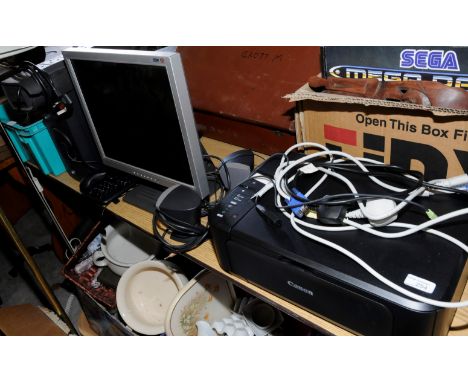 Canon Pixma wireless printer,  LG Flat screen monitor, keyboard, mouse, pair of computer speakers, APC surge protector and Ha