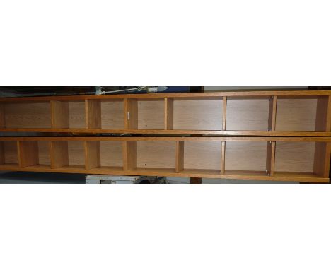 Pair of light oak multi tier CD/DVD towers 