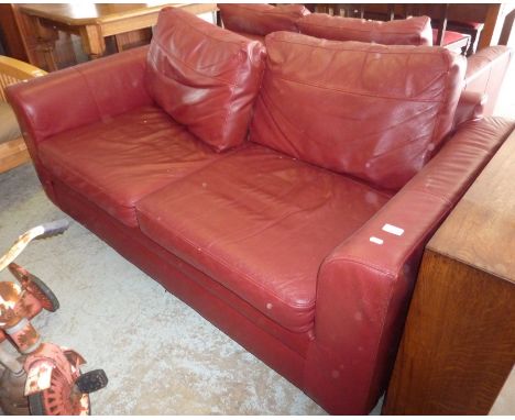 Two seat leather sofa and matching smaller two seat sofa 