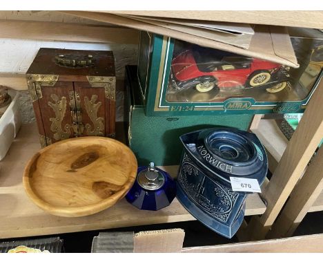 A wooden and brass chinoiserie table cabinet, a blue glass lighter, turned wood tazza and other items