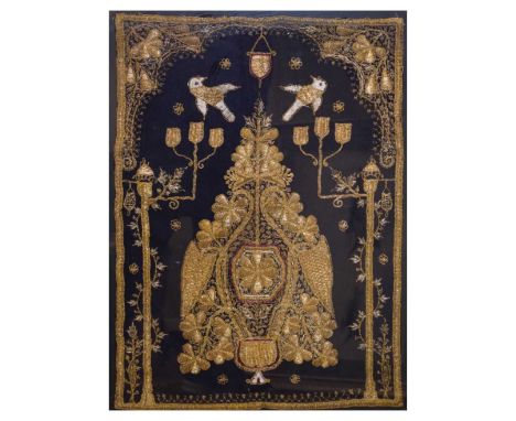 Indian or Persian gilt thread panel, worked with twin candelabra and two doves flanking a hanging lantern or censer, beneath 