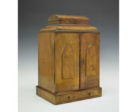 Victorian figured walnut table top collectors cabinet, the caddy top opening to reveal velvet lined interior over twin doors 