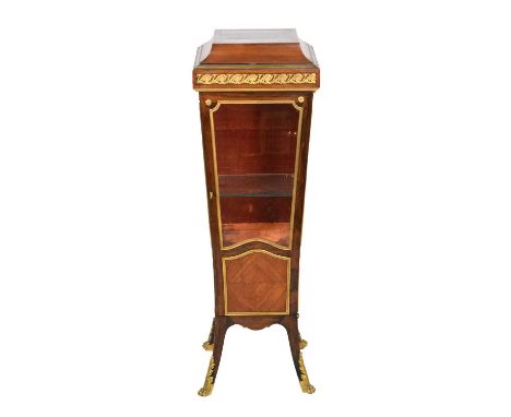 Early 20th Century rosewood and kingwood gilt metal mounted pedestal vitrine, of tapered form, with bevelled glazed side pane