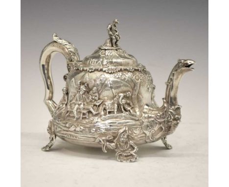 Early Victorian silver teapot of tapering circular form, chased and applied with tavern scenes in the manner of David Teniers