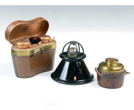 Two late 19th or early 20th Century novelty travelling inkwells, each with push release hinged cover revealing gilt metal int