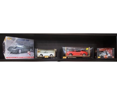 Four Maisto including Camaro, Mustang Mach III, Harley-Davidson Motorcycle and 1:24 scale Jaguar XK8 metal body model kit in 