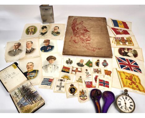 A collection of original sketches by Frank Moss, a pocket watch, cigarette case Bennett Braemar a pipe and a souvenir from 19