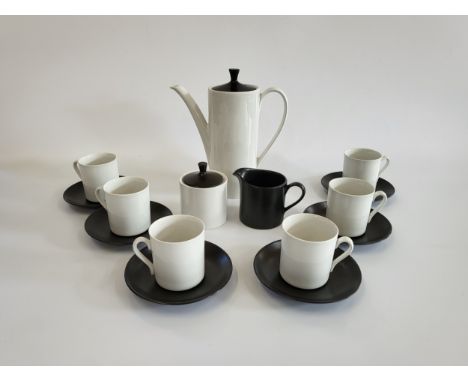 A Myott 1960's coffee service in black and white comprising of six cups and saucers (one chipped), a coffee pot, lidded sugar