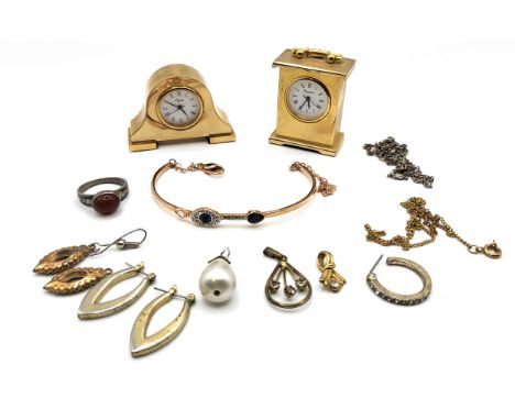 A quantity of costume jewellery including a rose coloured metal Swarovski bangle set with blue and white crystal (missing thr