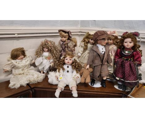 Eight modern bisque-headed dolls including Knightsbridge Collection and Regency Fine Arts. 32cm to 44cm. (8)