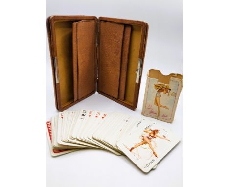 A tan concertina leather card case for packs of cards, containing a full pack of  vintage 'glamour girls' cards.