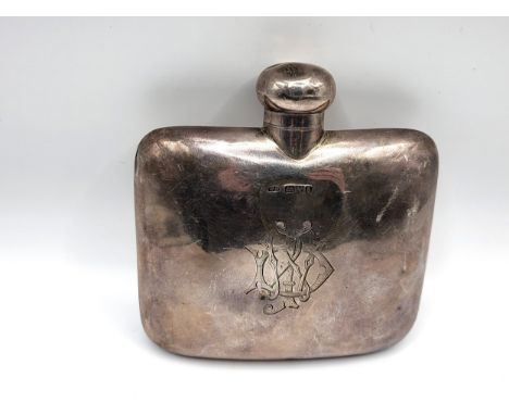 A monogramed, curved hip flask with a hinged cap. WN, Chester 1905. 11cm x 11cm. 107gms