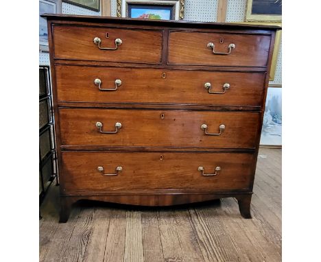 A mahogany chest of two short over three long drawers with brass handles, raised on swept out bracket feet. 103cm x 110cm x 5