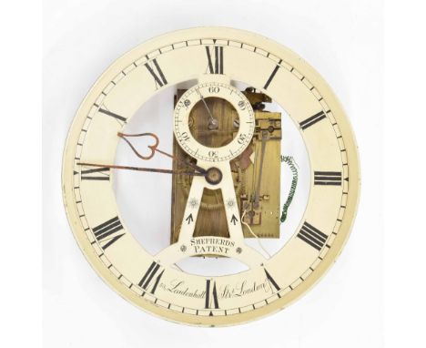 Very rare Shepherds London electric slave clock, the 12.5" cream enamel dial with skeletonised centre signed Shepherds Patent