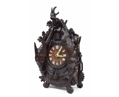 Good Black Forest double fusee two train cuckoo clock, the 6" wooden dial within a chalet case carved with hanging game and s
