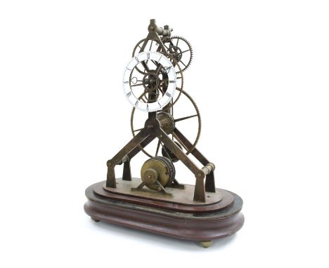 Brass single fusee great wheel type skeleton clock, the 4.5" white enamel chapter ring and movement upon triangular arched su