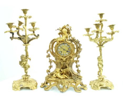Good French ornate cast ormolu two train mantel clock garniture, the Henry Marc movement with outside countwheel and striking