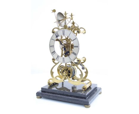 Good brass single fusee skeleton clock with passing strike on a bell, the 6" silvered chapter ring and movement upon curving 