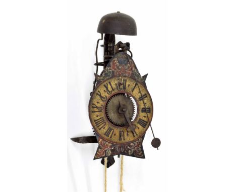 Interesting German iron hook and spike painted wall clock, the 5.5" chapter ring with open centre and iron hand before a cow 