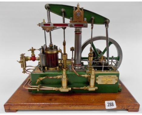 Good scratch built model of a beam engine, the wooden single cylinder driving a 7' wheel, finished in green and on stained wo