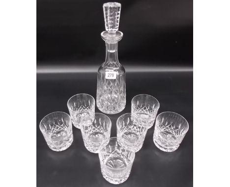Waterford cut crystal decanter and stopper together with seven matching tumblers