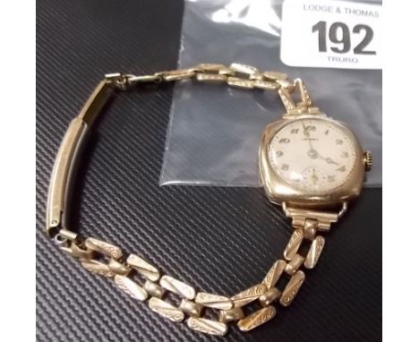1930's Longines ladies 9ct gold automatic wrist watch, the dial with gilt Arabic numerals and subsidiary second dial,  with 1