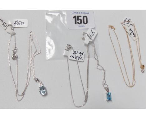 9ct gold and small diamond pendant on a fine chain, together with two 9ct aqua marine pendants on chains (3)