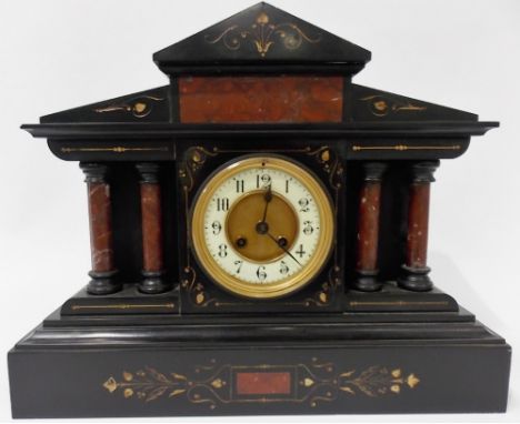 19th Century black slate and red marble two train mantle clock, the architectural case with four turned columns, height 14'