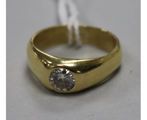An 18ct gold and gypsy set solitaire diamond ring, size K.