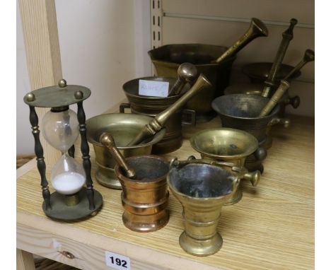 Seven mortars and pestles, two others and a timer