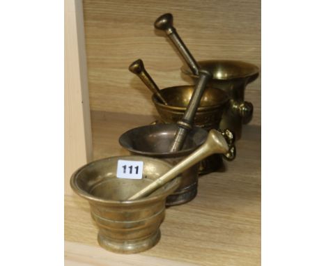 Four bronze mortars and pestles tallest 12.5cm