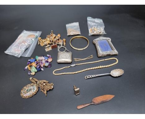 A small silver photograph frame; together with a quantity of costume jewellery and cufflinks. 