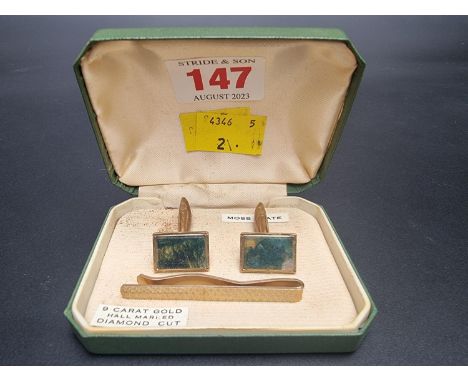 A cased pair of 9ct gold moss agate cufflinks and engine turned tie clip, gross weight 15g. 