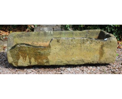 A RECTANGULAR CARVED STONE TROUGH (AF) 118cm long